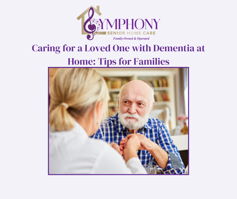 Caregiver holding hands with a senior living with dementia at home, offering comfort and support.