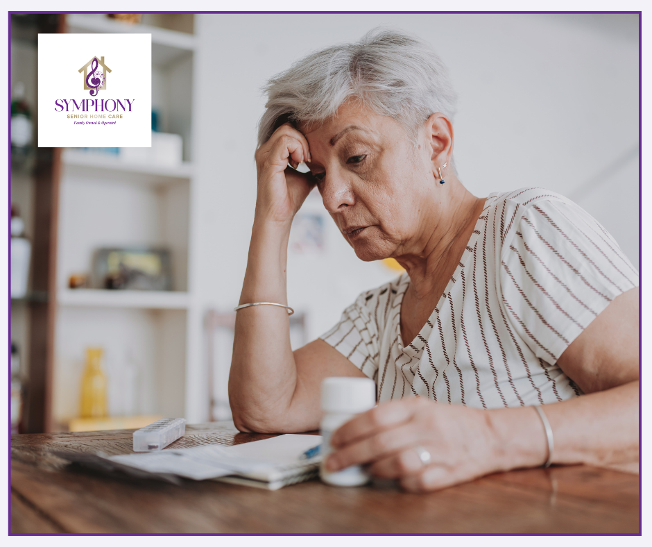 Senior woman reviewing medications at home in White Bear Lake, MN, illustrating early signs a parent may need in-home care.