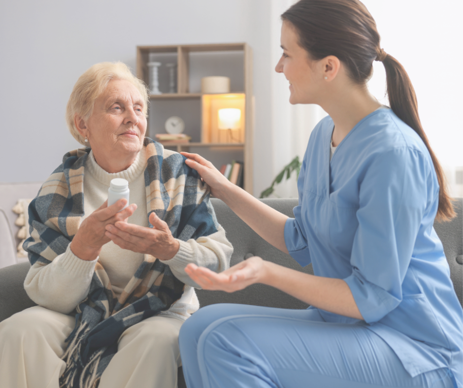 Caregiver discussing medication with senior client during in-home care visit