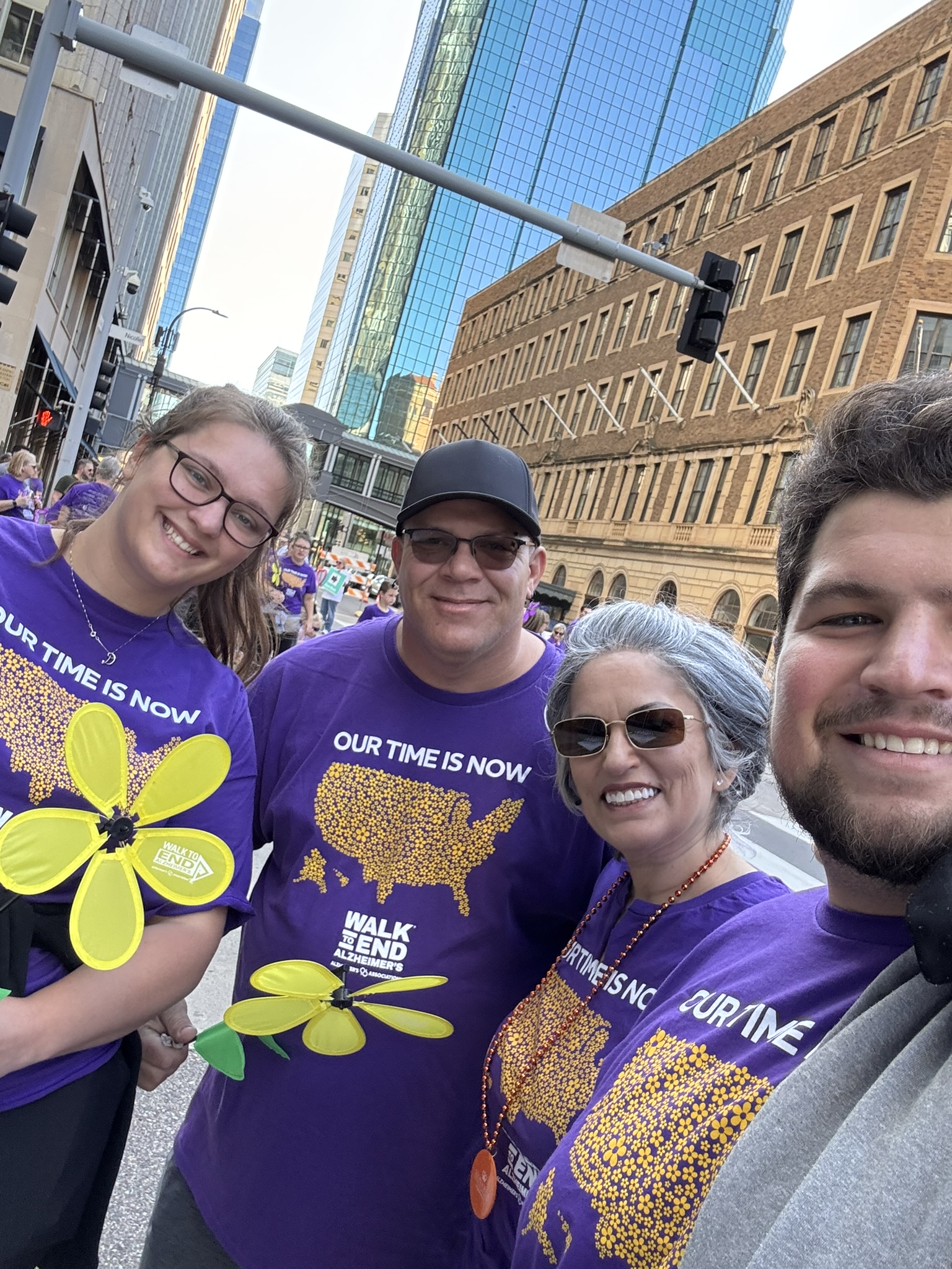 Symphony Senior Home Care team members wearing purple Walk to End Alzheimer's shirts at the Twin Cities walk event